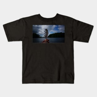 Holding Up a Feather at the Lake Kids T-Shirt